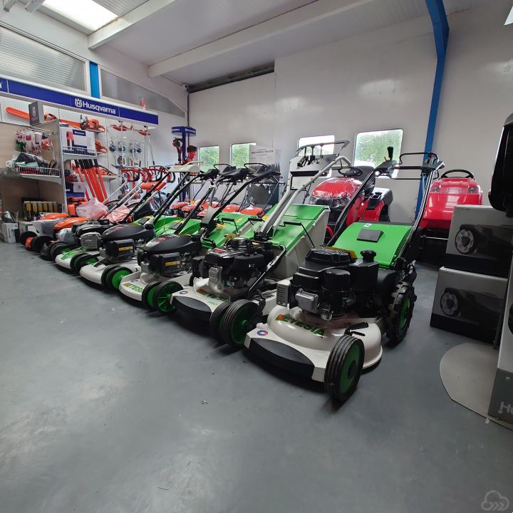 Pedestrian lawn mowers